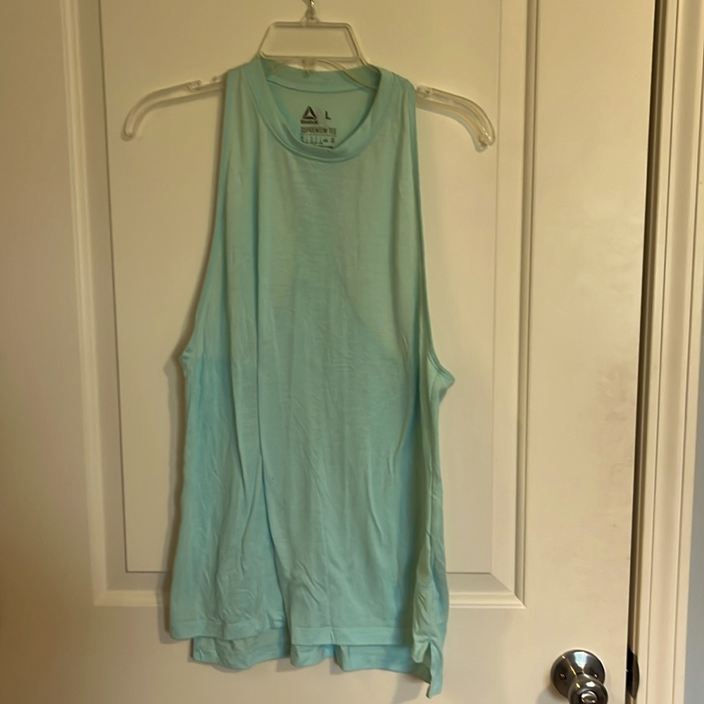 Reebok large razorback tank supremium tee, speed wick, light turquoise